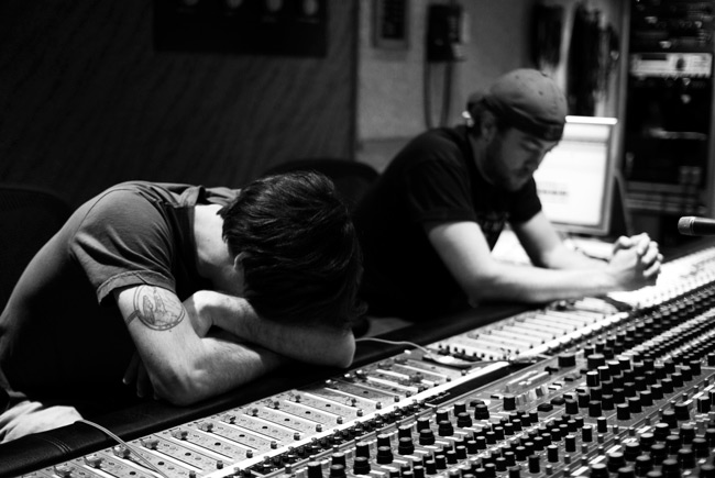 Joel Nass and Geoff Neal in the control room listening to vocal tracks from Sex & Sound EP by The Violet Lights